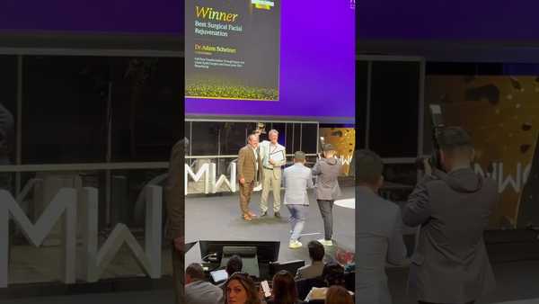 Dr. Scheiner receiving recognition at the AMWC Monaco conference