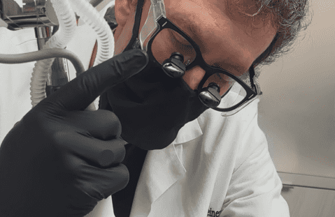 Dr. Scheiner performing a procedure.