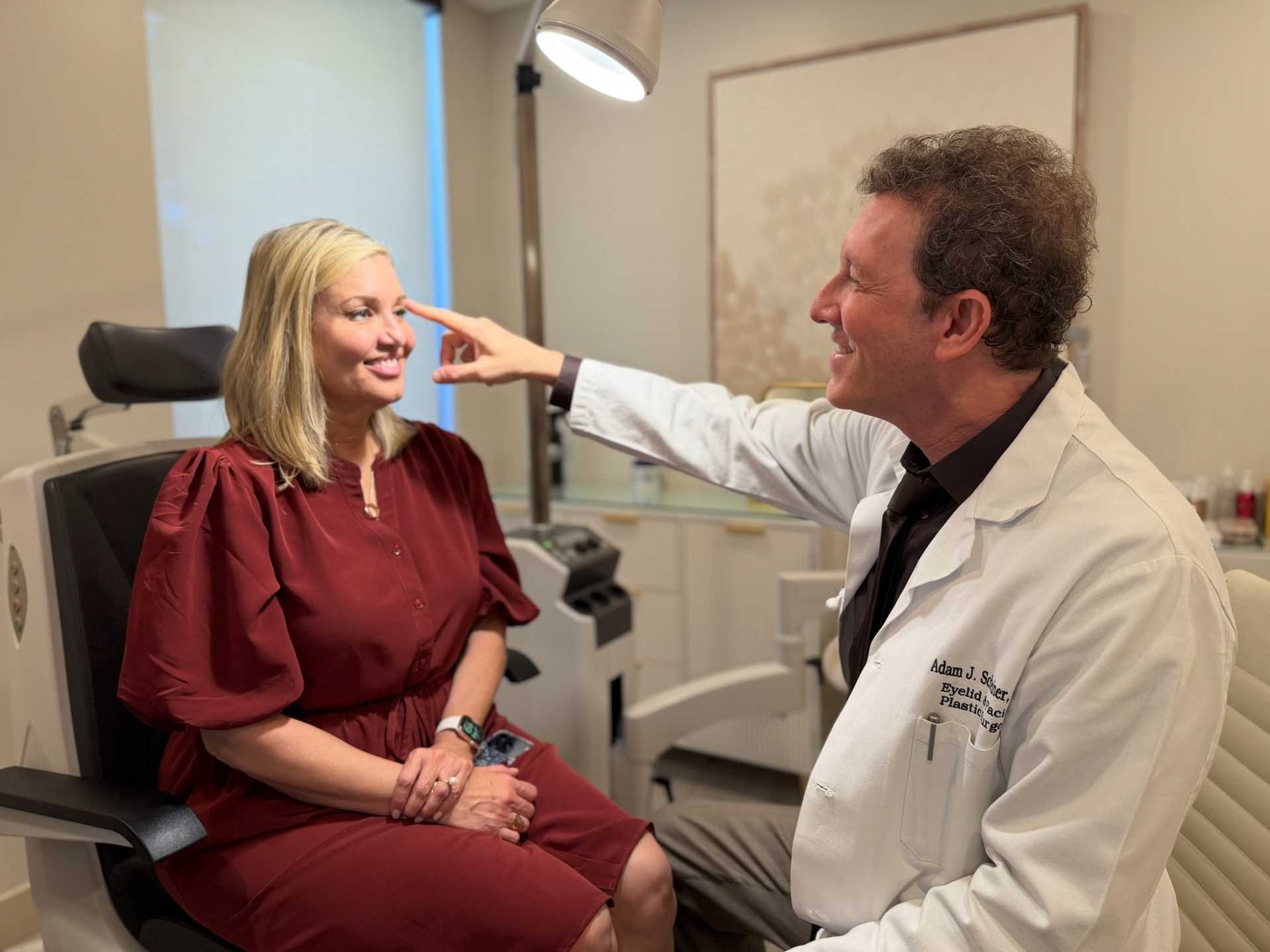 Dr. Scheiner consulting with a patient.